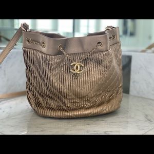 CHANEL Gold Lambskin Leather Drawstring Bucket Bag